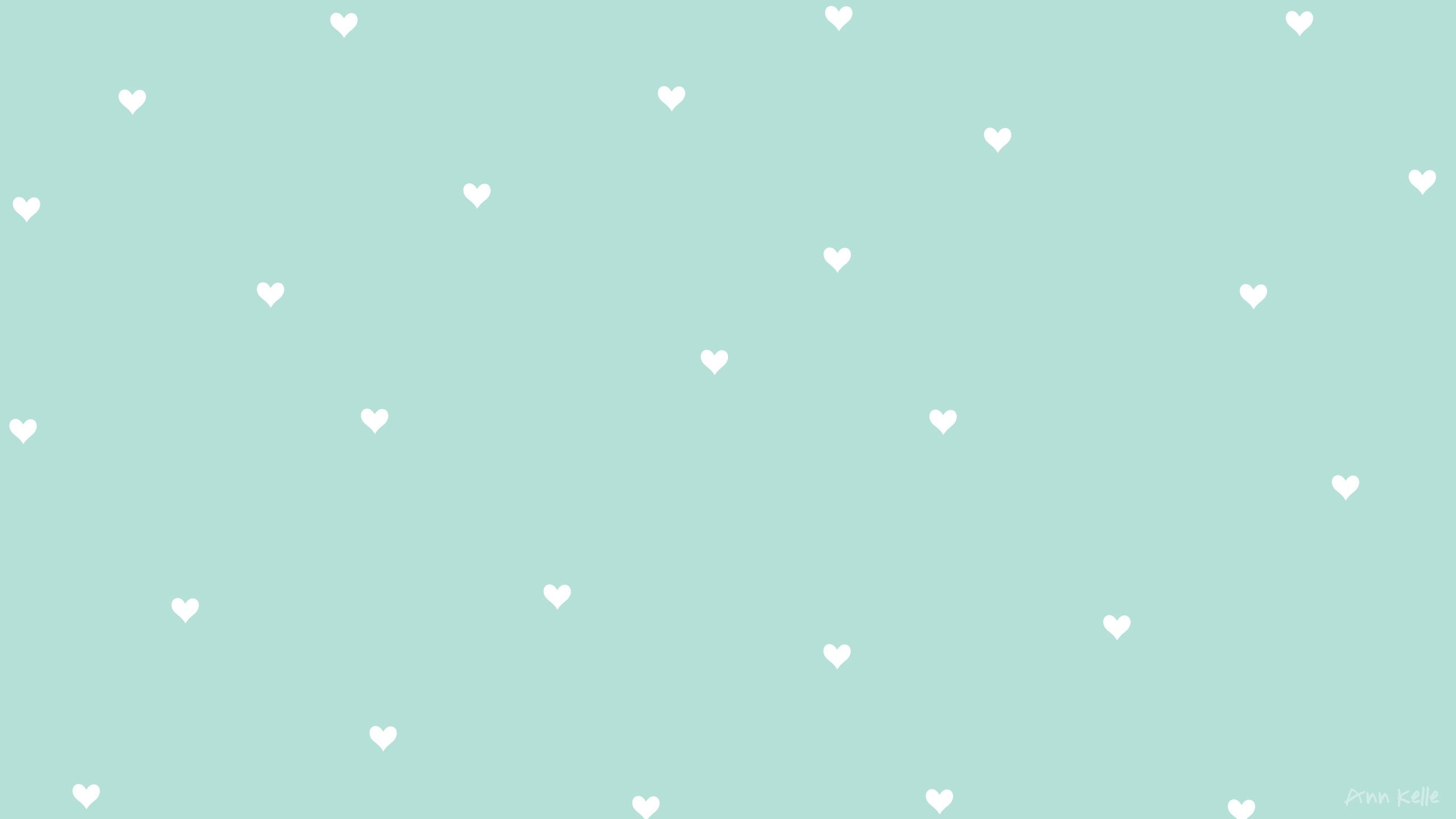 Teal wallpaper with small white hearts <3